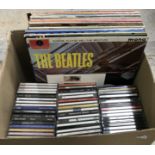 A collection of LPs including The Beatles "Please Please Me", The Searchers "Sugar and Spice",