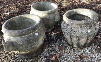 Three reconstituted stone garden pots