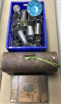 A crate containing various modern pewter tankards,