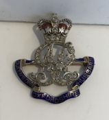 A gold mounted diamond and enamel set badge “Queen's Own Oxfordshire Hussars”, 2.8 cm x 2.9 cm, 5.