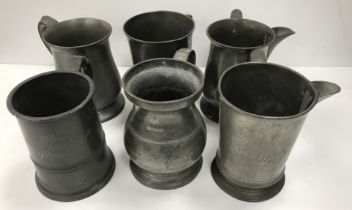 A collection of six 19th Century pewter quart mugs, one inscribed "H J Burn Bulls Head, Wood St,