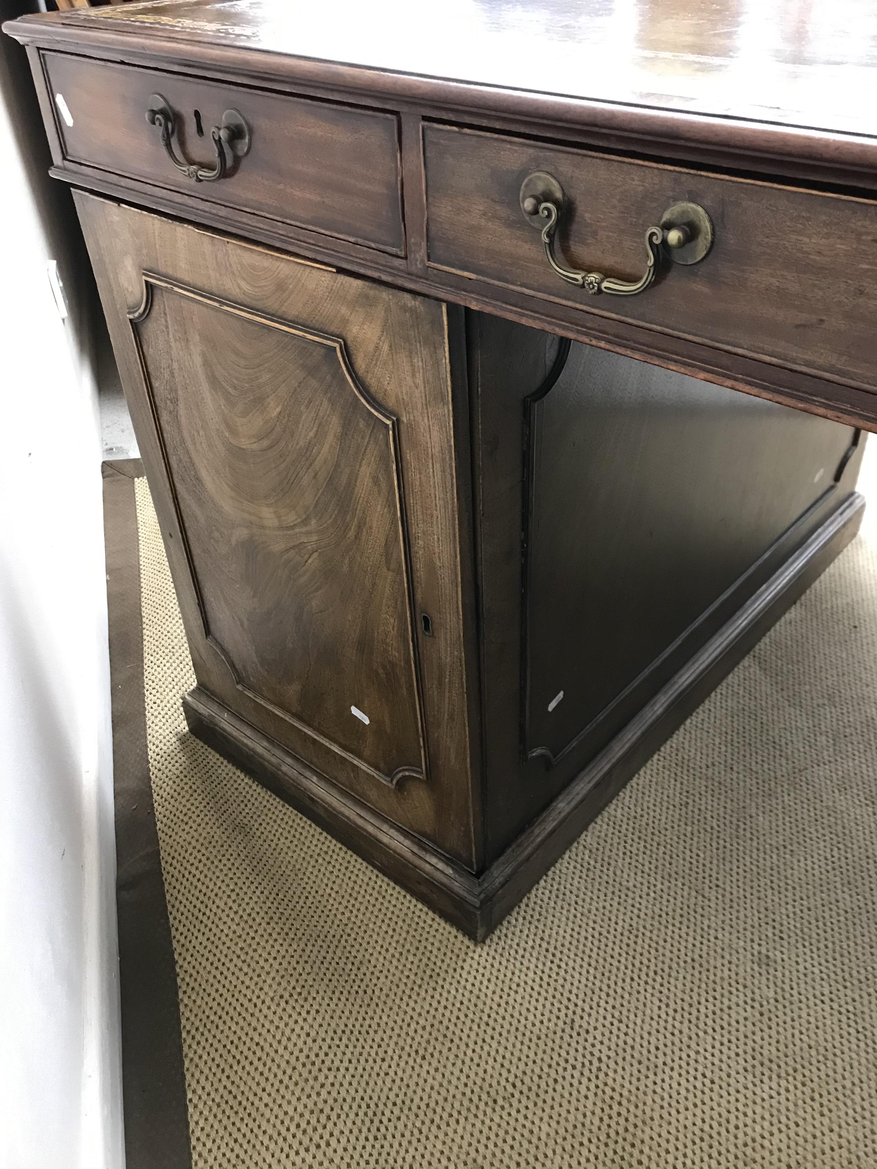 A mahogany double pedestal partners desk in the George III style, - Bild 2 aus 74