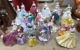 A collection of twenty-nine various figurines to include ten Royal Doulton examples including