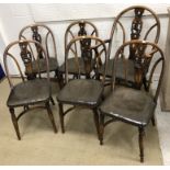 A set of six circa 1946 stained beech framed Windsor type dining chairs,