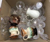 A box containing assorted glassware to include decanter, various drinking glasses, etc.