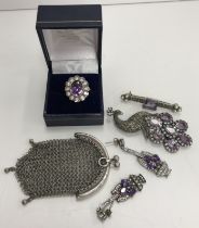 A collection of jewellery to include an amethyst set dress ring,