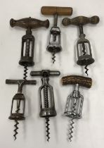 A collection of six various Continental corkscrews including a Belgian steel example,