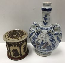 A 19th Century Dutch Delft faience ware vase in the chinoiserie taste with goats head handles and