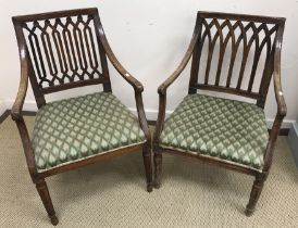 Two 19th Century Sheraton Gothic Revival style swept arm elbow chairs with upholstered seats on