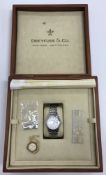A Dreyfuss & Co series 1890 steel wristwatch No'd 1558,