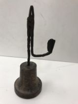 A circa 1700 iron rushnip holder on a turned wooden base,