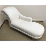 A modern upholstered scroll end chaise longue in the Victorian style,