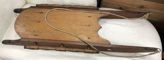 A vintage F H Ayres of London pine and plywood sledge / toboggan,