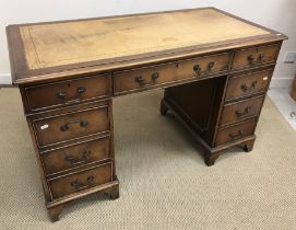 A mahogany kneehole desk in the Georgian style,