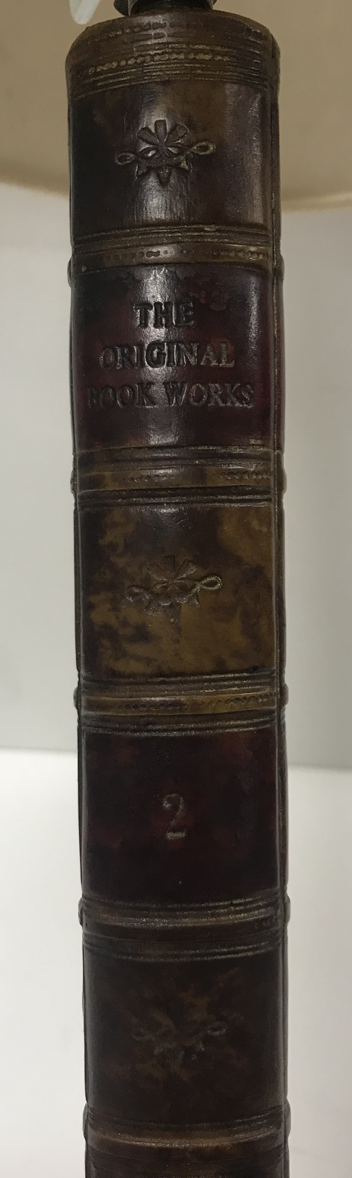 A decorative table lamp as book spines "Original Bookworks - 2" on a base of two books "Goldsmiths - Image 5 of 5