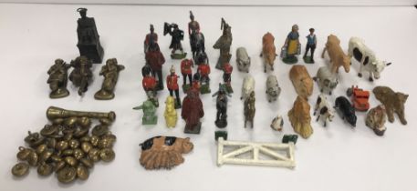 A collection of Britains military figures and farm animals and three painted lead Beatrix Potter