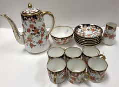 A Royal Crown Derby Japan pattern coffee service with all over flower head decoration (pattern No.