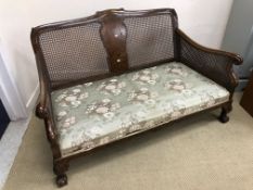 An early to mid 20th Century walnut framed bergere three piece suite with single caned back and