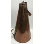 A large copper and brass conical container with hinged lid and carrying handles in the manner of