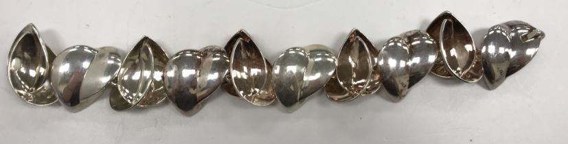 A Tiffany & Co heart bracelet designed by Frank Gehry stamped "Tiffany & Co Gehry 925", 22 cm long,