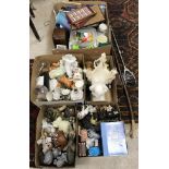 Five boxes of assorted sundry items to include elephant ornaments, mugs, mantel clock,