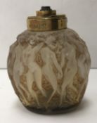 A Lalique frosted glass scent atomiser “Calendal cavorting with bacchanals”,