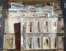 A collection of cigarette cards Ships and Shipping including W D & H O Wills Merchant Ships of the