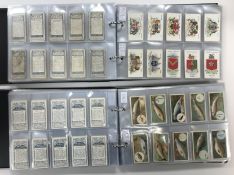 Two albums containing a collection of Wills's cigarette cards circa 1900-1910 including Arms of the
