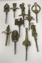 A collection of brass handled corkscrews decorated with place names including The Old Oasthouse,