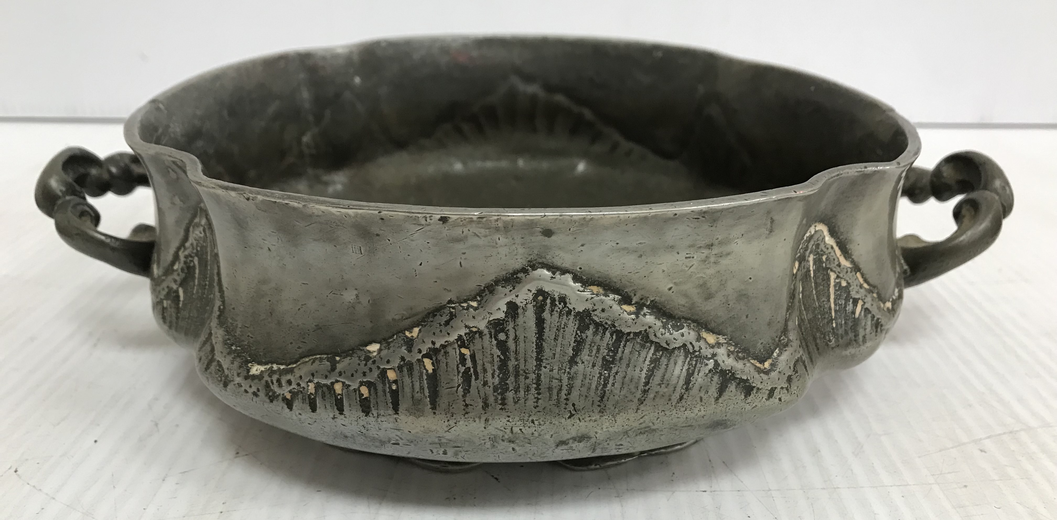 An early 19th Century German heavy embossed pewter tureen and associated plate base bearing pewter - Image 5 of 8