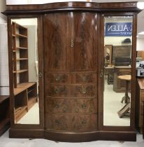 An Edwardian mahogany and satinwood banded breakfront wardrobe compactum,