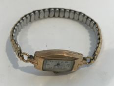 A 9-carat gold cased ladies' wristwatch with expanding bracelet, 16.
