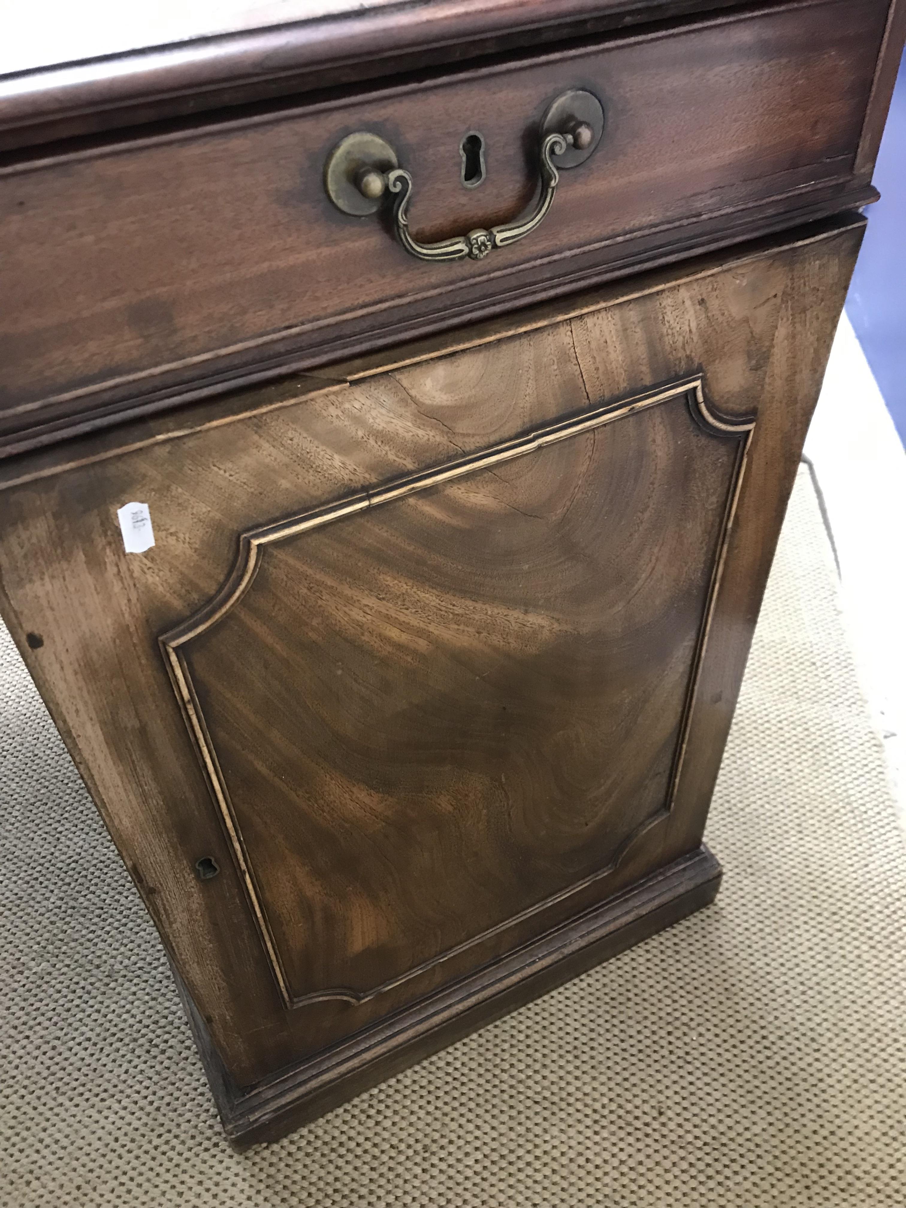 A mahogany double pedestal partners desk in the George III style, - Bild 3 aus 74