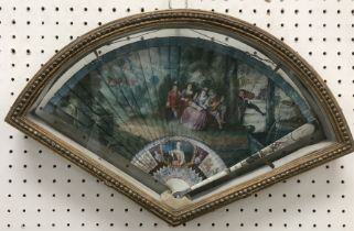 WITHDRAWN An 18th Century French fan with hand painted decoration of figures in a garden setting