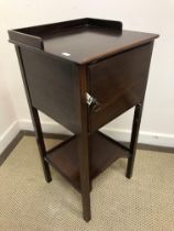 A mahogany nest of three occasional tables in the Georgian style on turned and ringed supports to