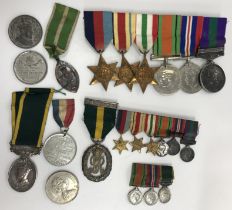 A collection of medals to include a bar comprising the 1939-45 Star, the Africa Star,