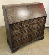 An early 19th Century oak bureau,