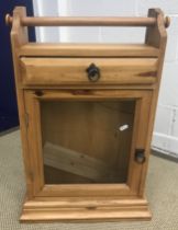 A modern pine dresser, the two tier boarded plate rack over two drawers and two cupboard doors 91.