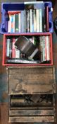 A vintage wooden drop down tool box containing various vintage hand tools to include hammers,