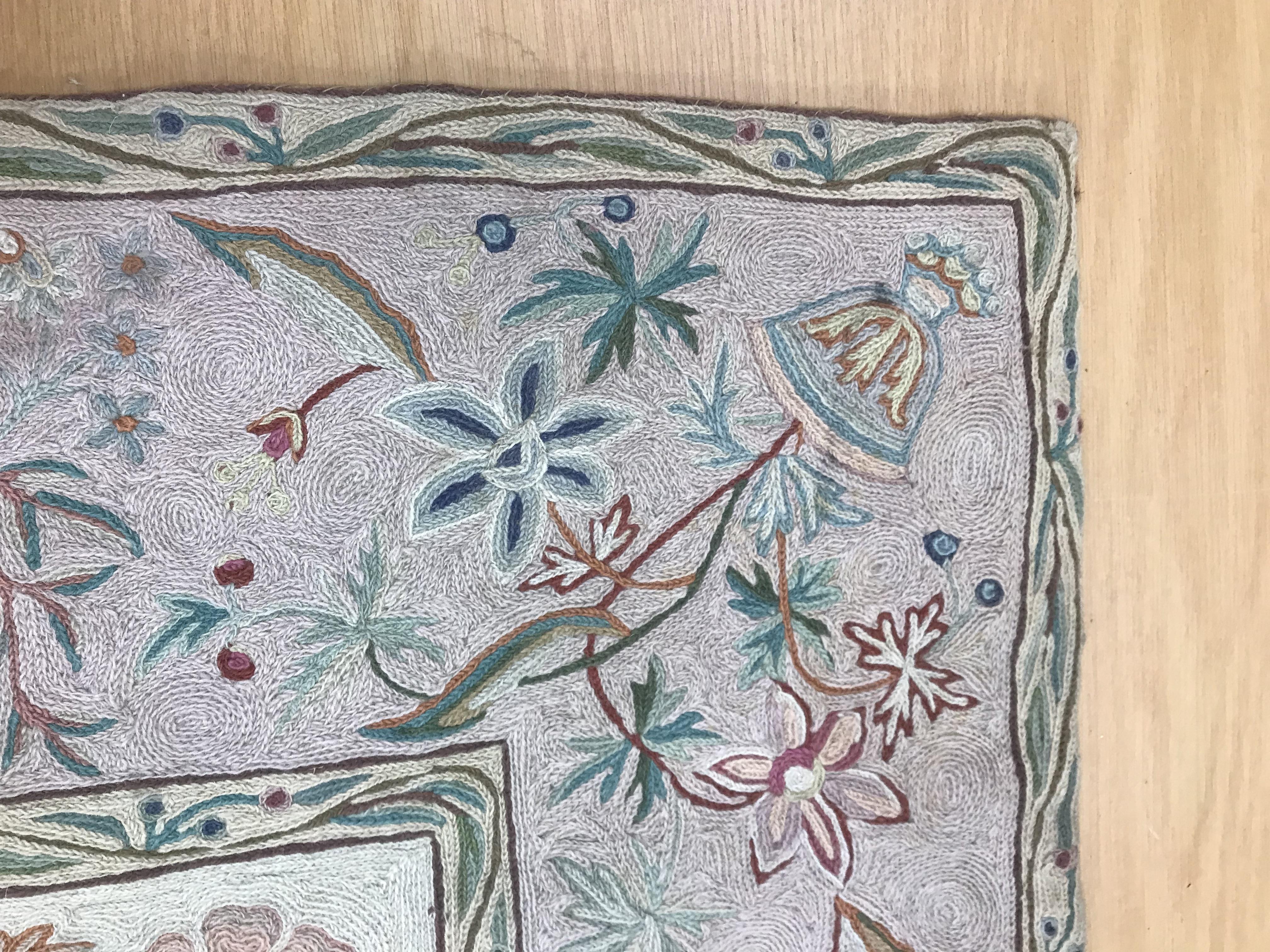 A pair of early 20th Century crewelwork panels with floral decoration on cream and pink grounds, - Image 9 of 21