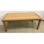 A modern oak rectangular coffee table, 118 cm wide x 66.5 cm deep x 45.