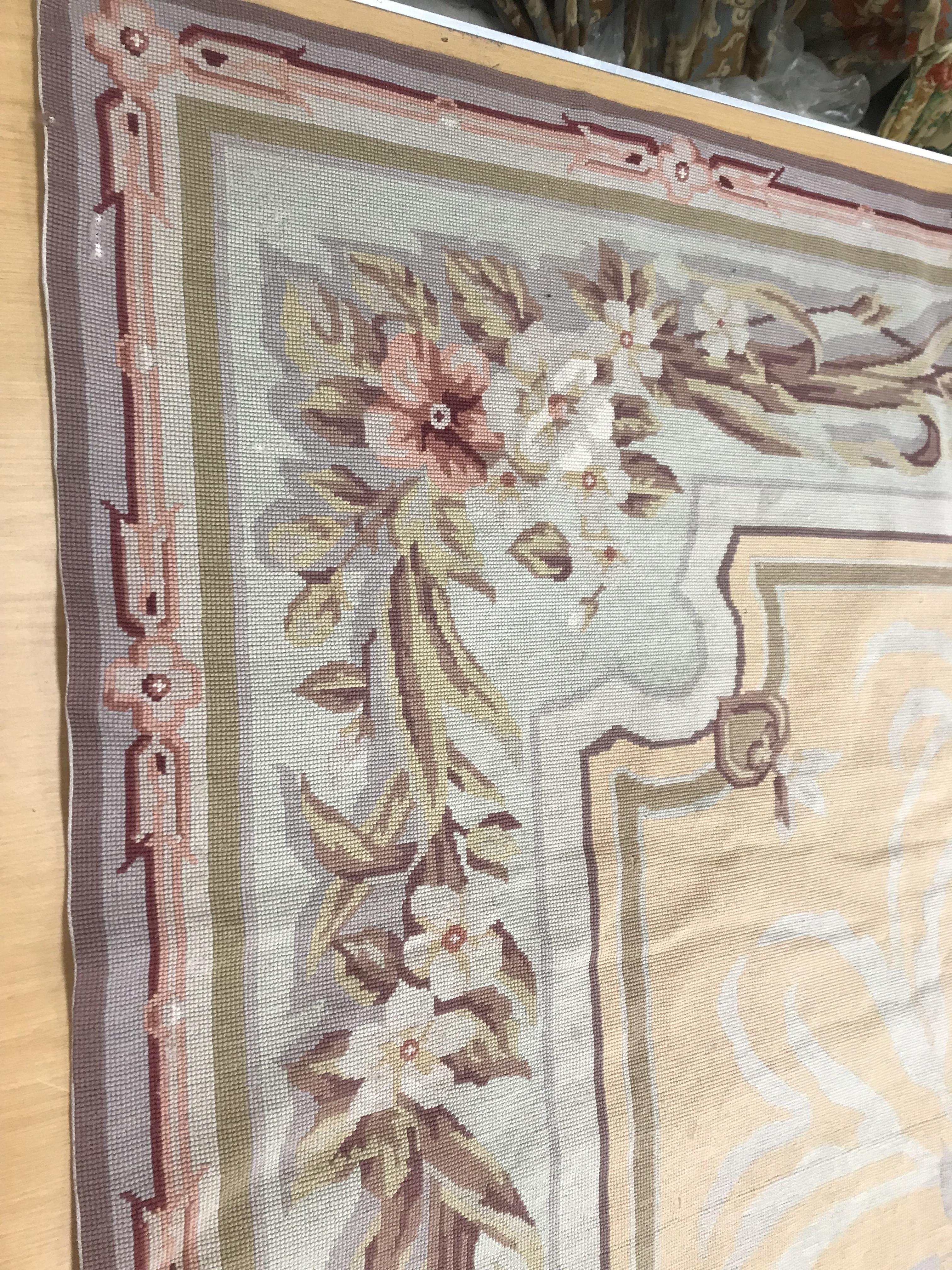 A needlepoint rug, the peach ground set with scrolling foliate design within a stepped border, - Image 4 of 9