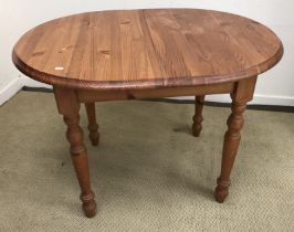 A modern pine D end kitchen table, 105 cm long x 79 cm wide x 75 cm high,