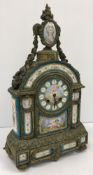 A 19th Century French gilt brass cased mantel clock set with hand-painted Sèvres style porcelain