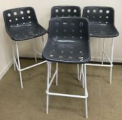 A set of four mid to late 20th Century "Loft" design moulded grey plastic and white painted tubular