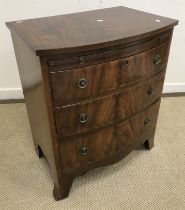 A mahogany bow fronted bachelor's chest of small proportions in the Georgian style,