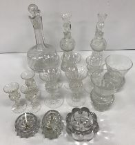 A collection of cut glass thistle-shaped glassware comprising two tumblers, three liqueur glasses,