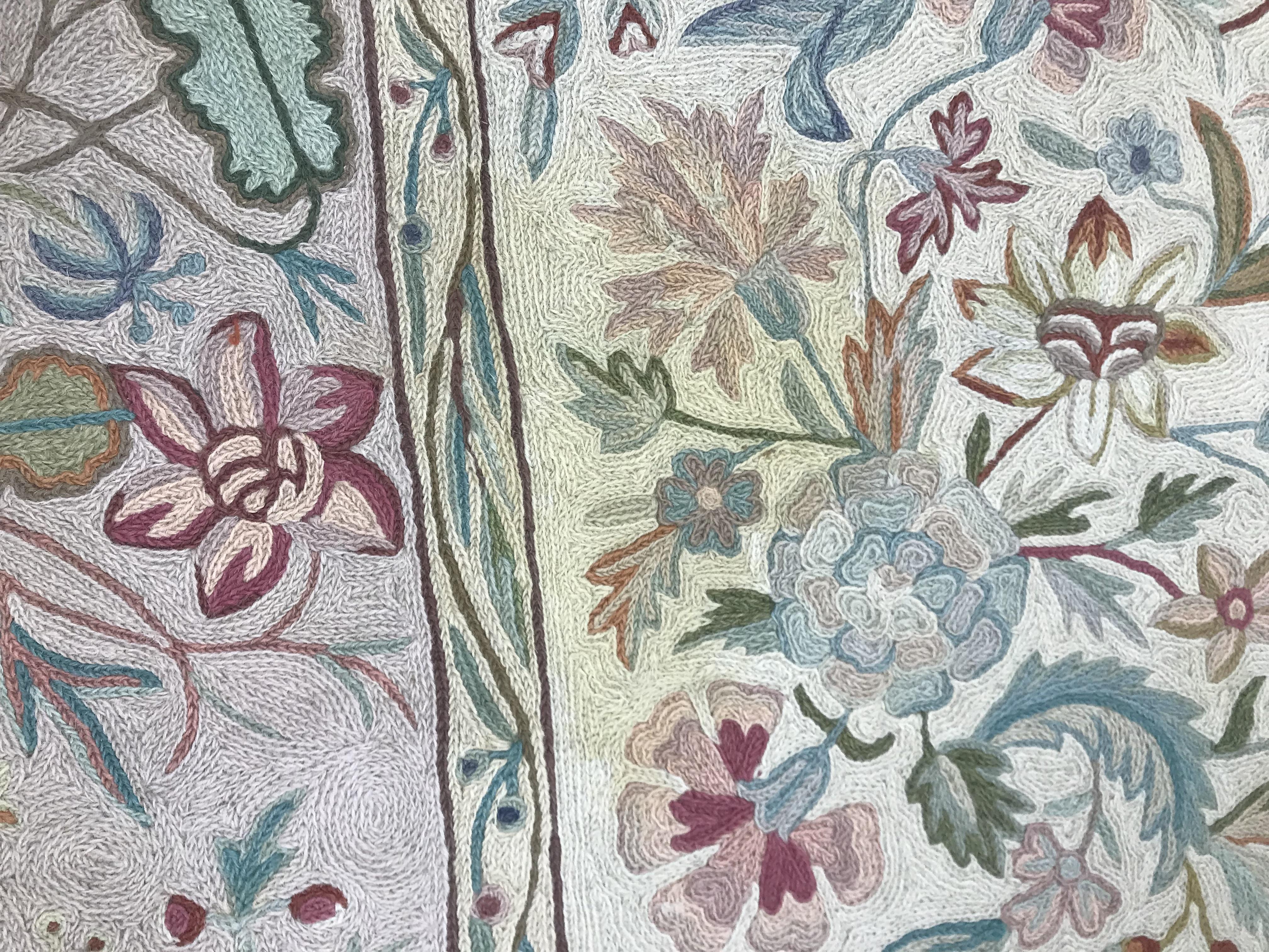 A pair of early 20th Century crewelwork panels with floral decoration on cream and pink grounds, - Image 8 of 21