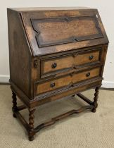 An early 20th Century oak bureau in the 17th Century style,