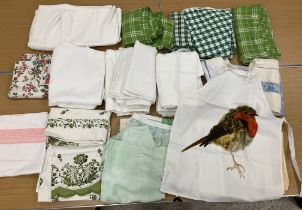 A box containing various household table linens etc to include cotton tablecloths
